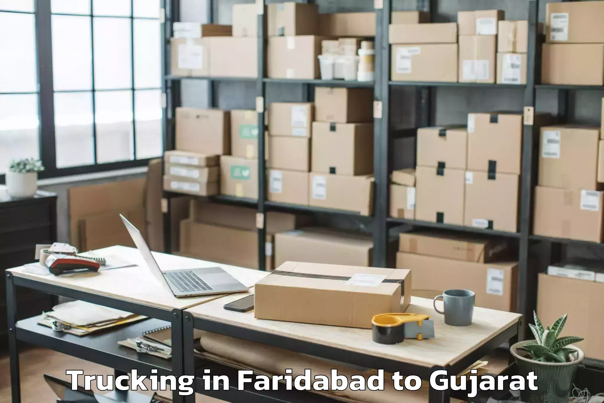 Quality Faridabad to Gadhada Trucking